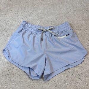 Vuori Women's Athletic Shorts in Soft Blue